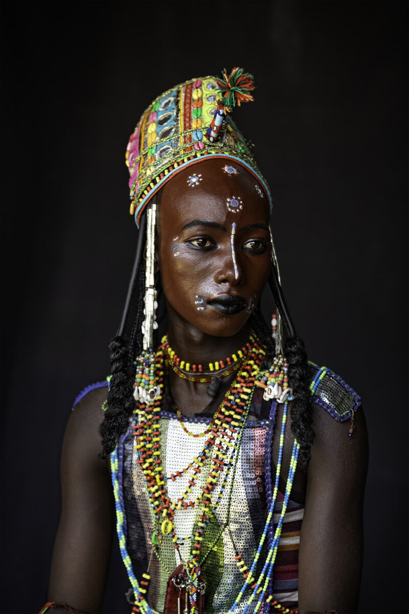 Portrait of a young Wodaabe Fula man in Chad by Stephen Hermida