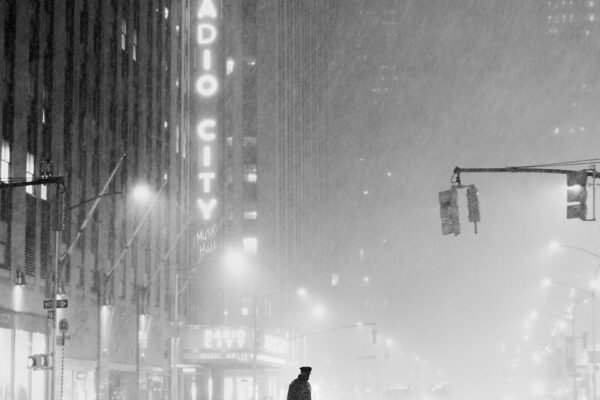 black and white street photo of New York in snow by Jc Calingo