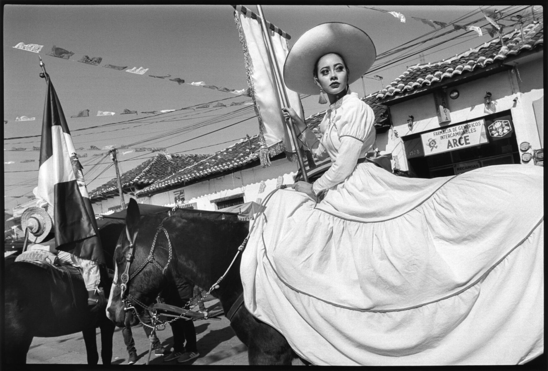 black and white photo of Parade queen, Festival de la Virgen de Guadalupe, Chiapas, Mexico by Jenna Mulhall-Brereton