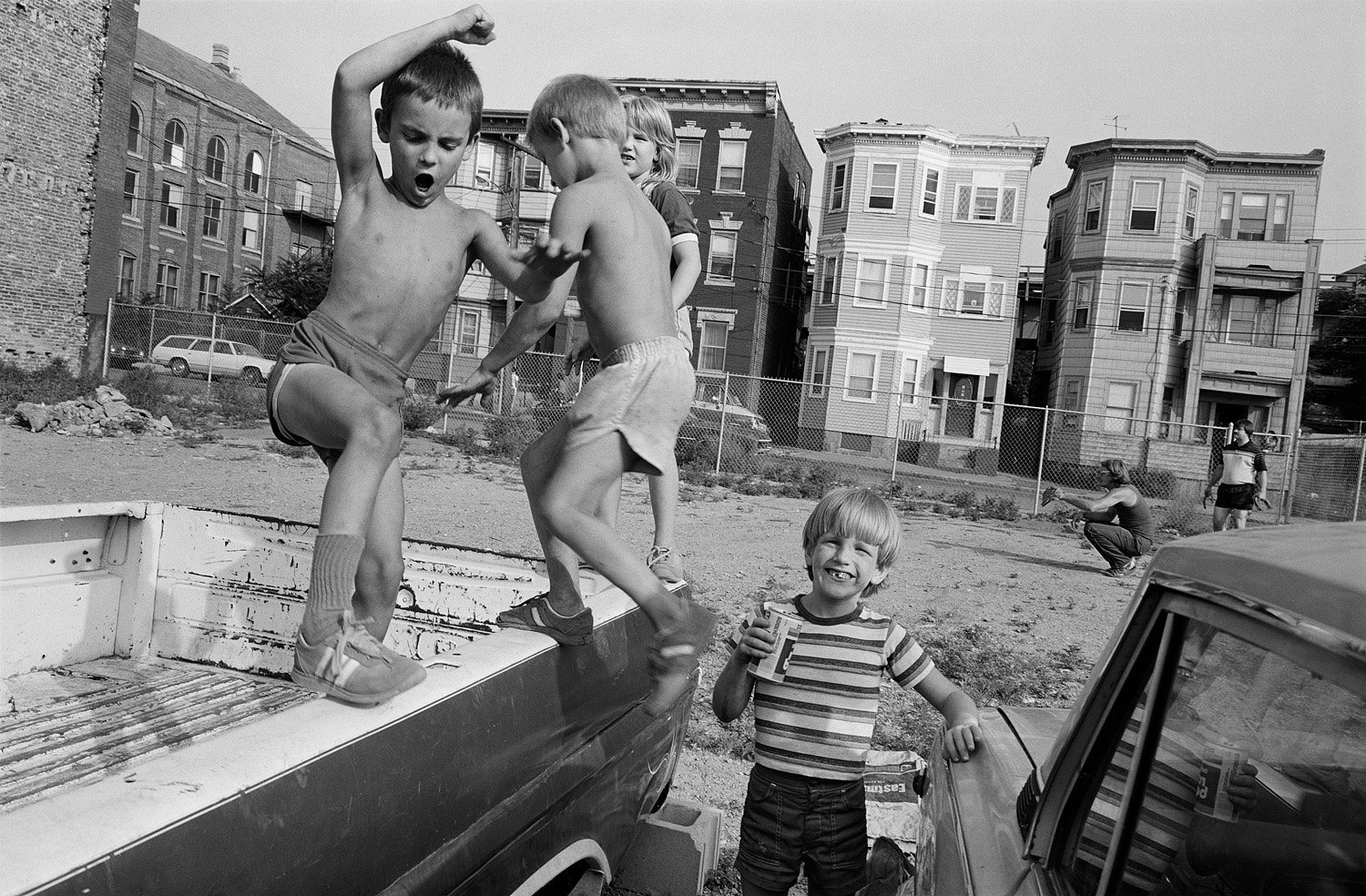 Black & white photography by Sage Sohier, children playing, 1982