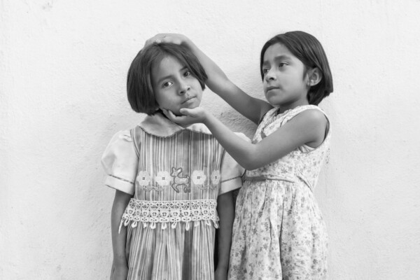 black and white portrait photo of two girls by Alejandra Lopez Zaballa