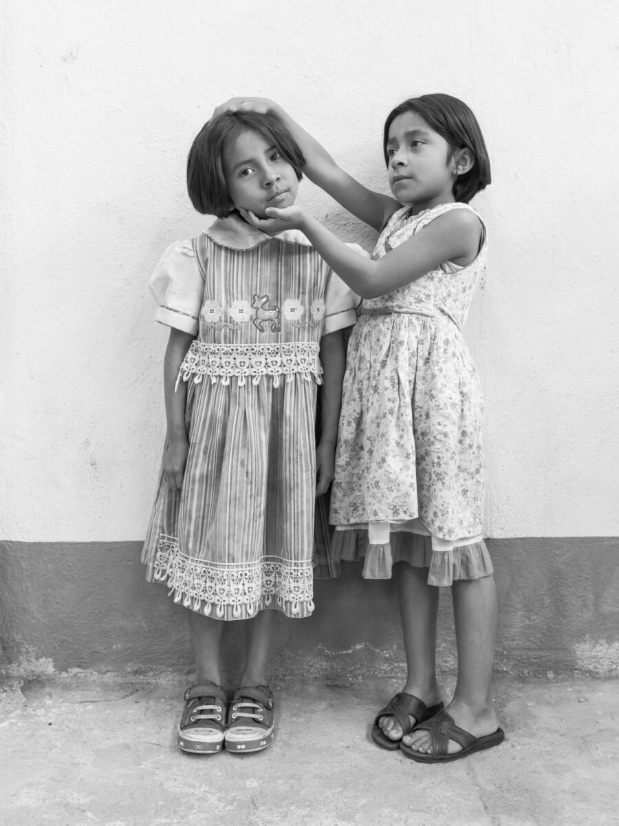 black and white portrait photo of two girls by Alejandra Lopez Zaballa