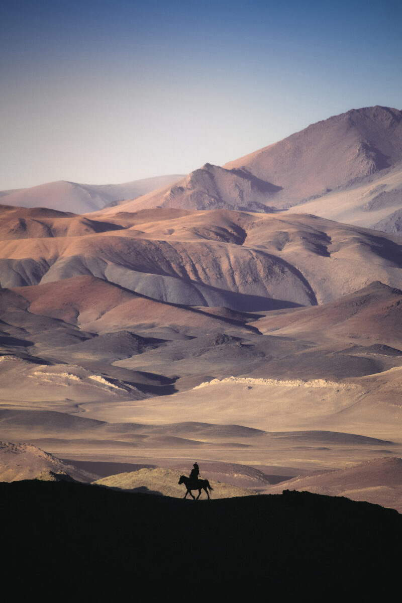 color documentary photo of a horse rider in Altai Mountains, Western Mongolia by Diana barthauer