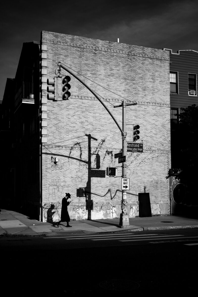 black & white street photo of man in New York subway by Kevin P. Gould