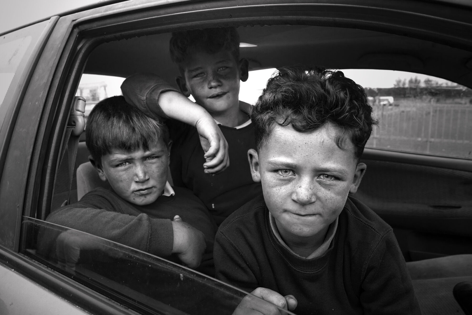 black and white portrait of young boys in Galway, Ireland by Rebecca Moseman