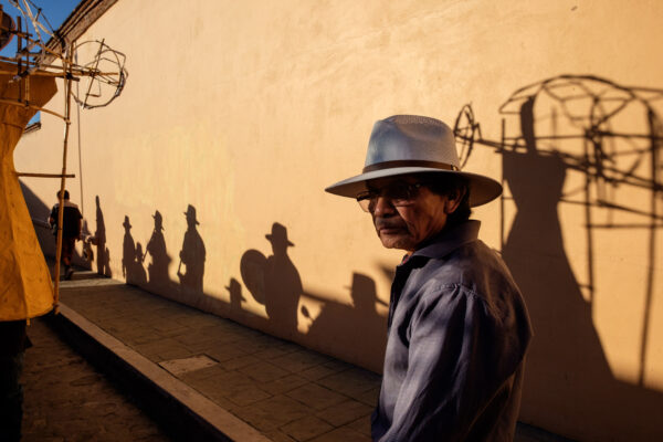 color street photo and portrait of man in Oaxaca, Mexico by Alejandro Estrada