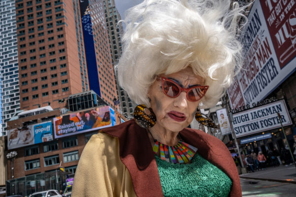 color candid street photo portrait of woman in New York by Alexandra Avlonitis