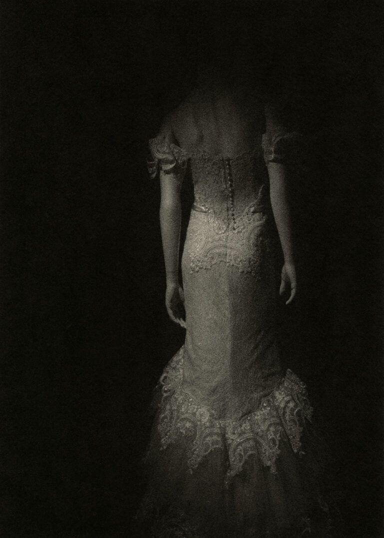 Black & white photography by Dominic Turner. Woman in wedding dress