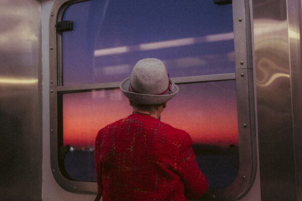 color street photo of woman in New York by Olivier Lei