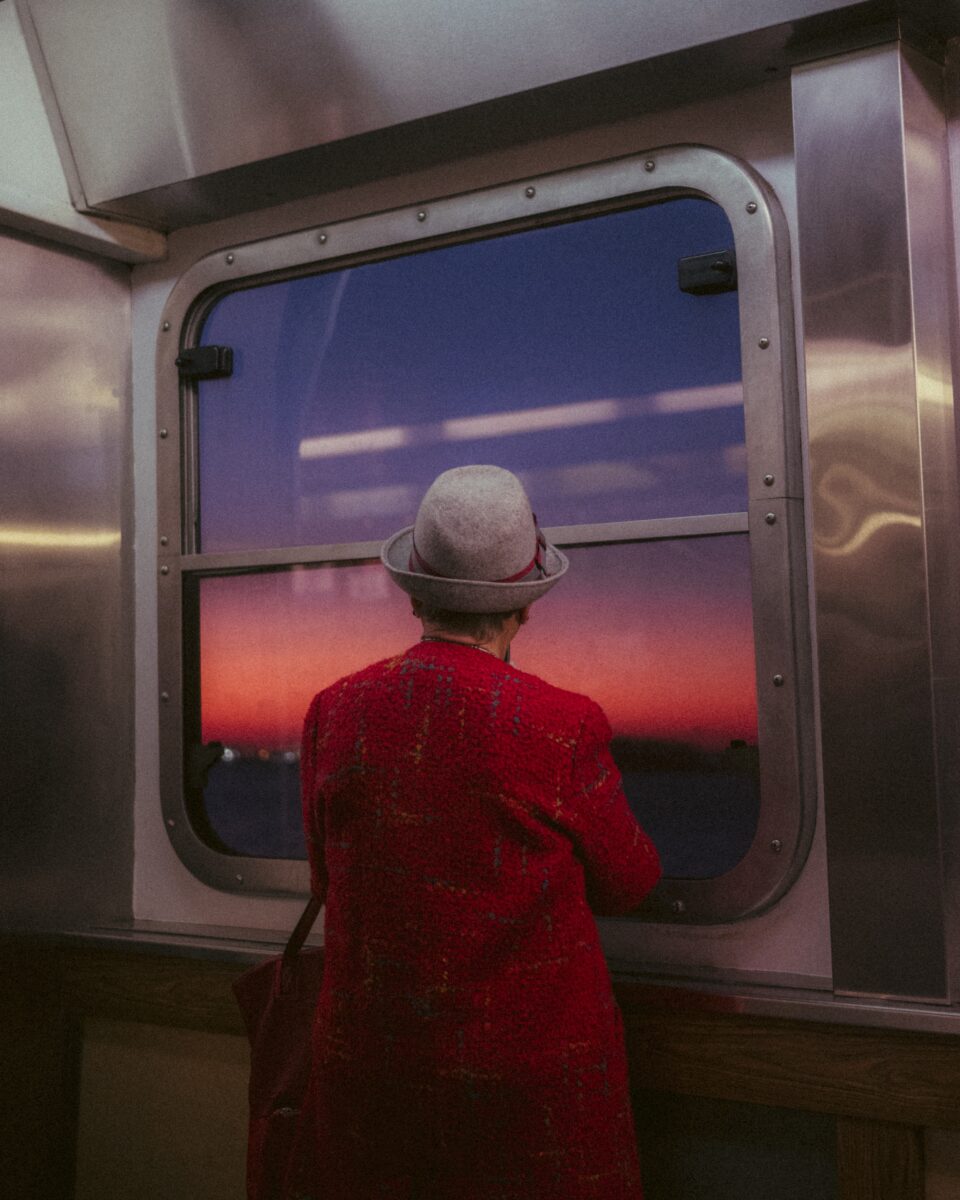 color street photo of woman in New York by Olivier Lei