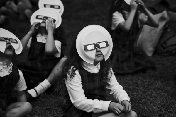 black and white street photo of children