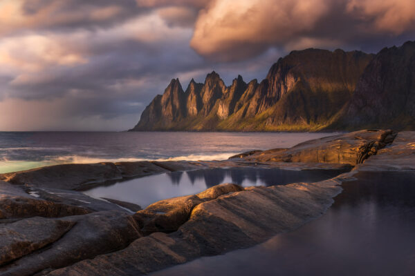 color landscape photo of Norway coastline and mountains by Lukas Trixl