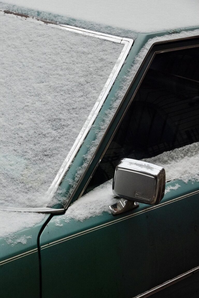 color street photo of car under snow in new york, usa by Mikko Takkunen
